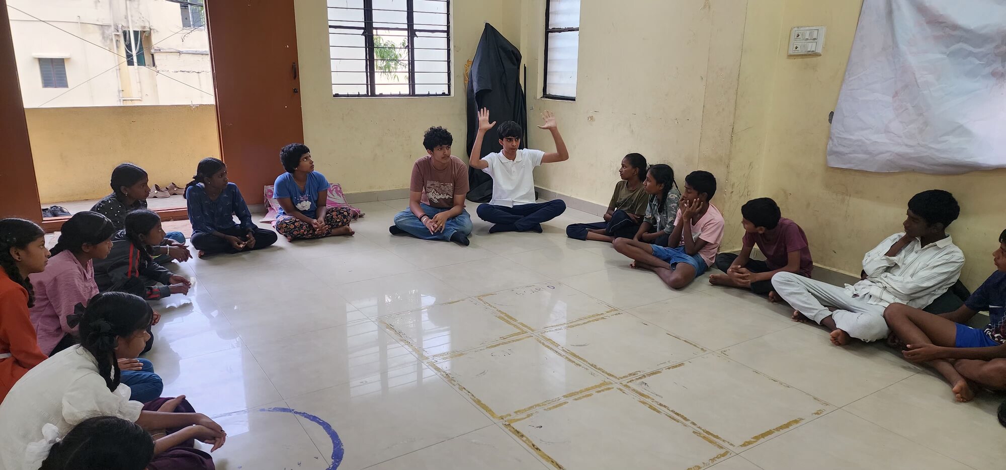 A circle discussion during an outreach activity